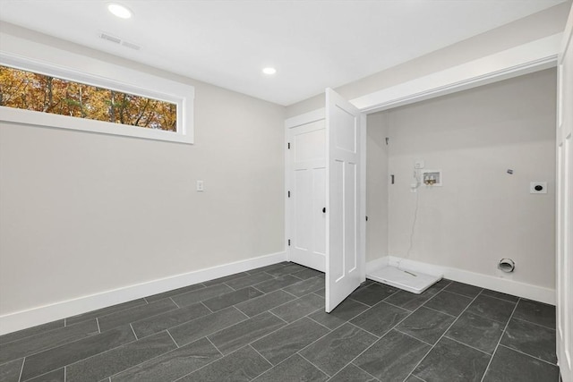 clothes washing area with hookup for an electric dryer and hookup for a washing machine