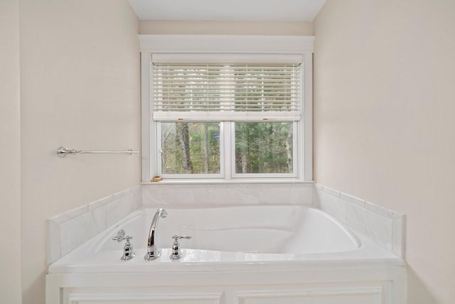 bathroom featuring a garden tub