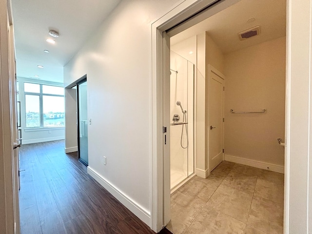 corridor with tile floors