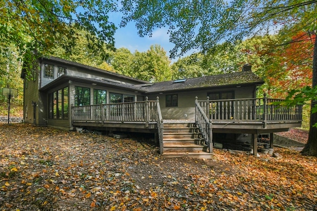 rear view of property with a deck