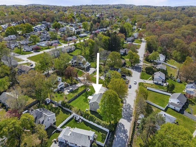 aerial view featuring a residential view and a forest view