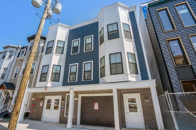 223 Saratoga St Unit U203, Boston, MA 02128 - view of property with an attached garage