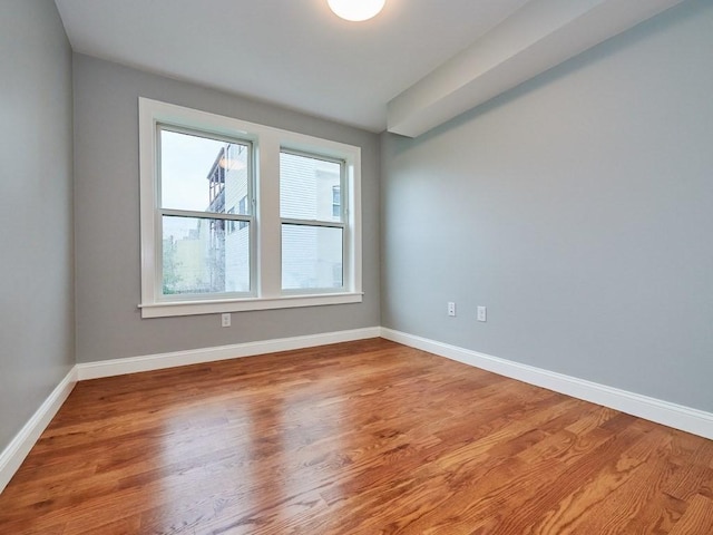 223 Saratoga St Unit U203, Boston, MA 02128 - unfurnished room featuring baseboards and wood finished floors