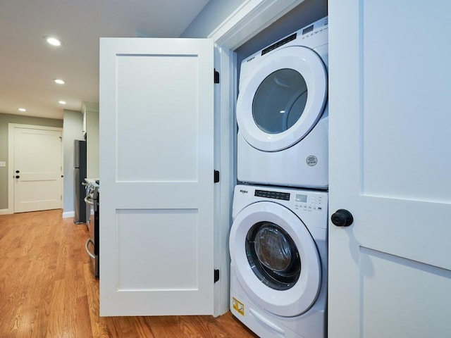 223 Saratoga St Unit U203, Boston, MA 02128 - washroom featuring stacked washer / drying machine, light wood-style flooring, and recessed lighting