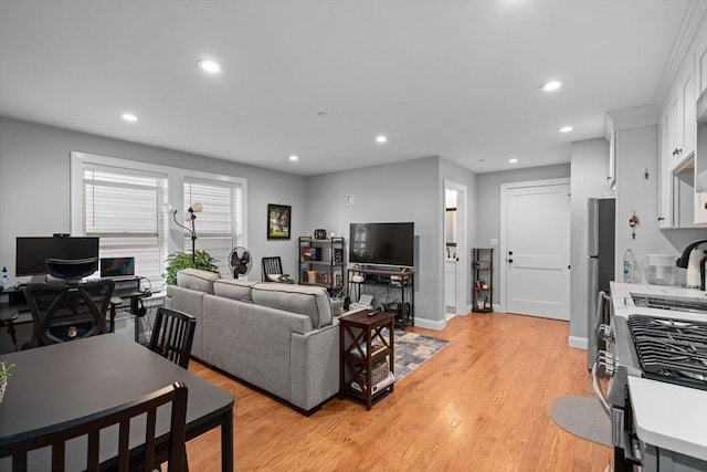 223 Saratoga St Unit U203, Boston, MA 02128 - living room with recessed lighting, light wood-style flooring, baseboards, and a desk