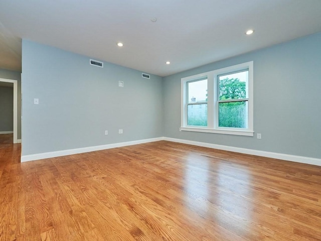 223 Saratoga St Unit U203, Boston, MA 02128 - spare room with baseboards, light wood-style flooring, and recessed lighting