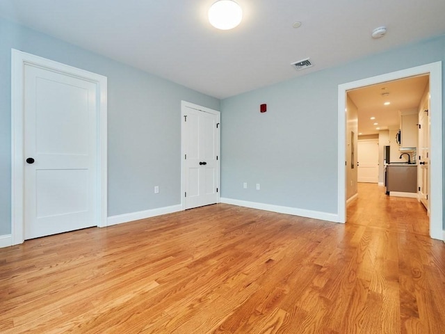 223 Saratoga St Unit U203, Boston, MA 02128 - unfurnished bedroom featuring light wood-type flooring and baseboards