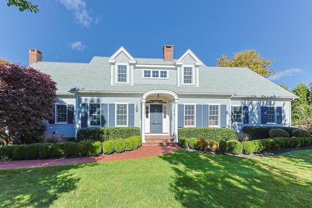 view of front of home with a front yard