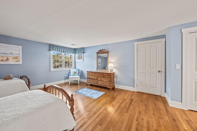 bedroom featuring light hardwood / wood-style floors