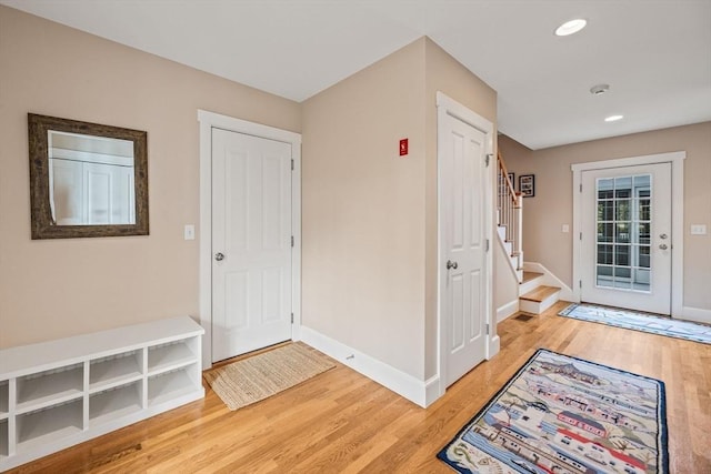 foyer with hardwood / wood-style flooring