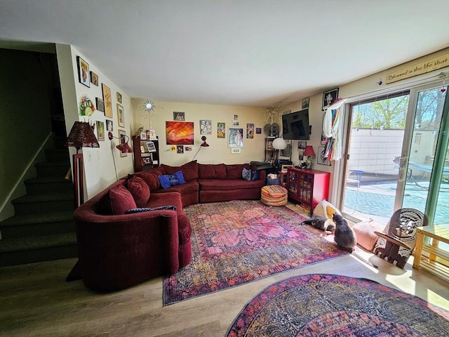 12 Sutton Ct Unit 12, Amherst, MA 01002 - living room with stairway and wood finished floors