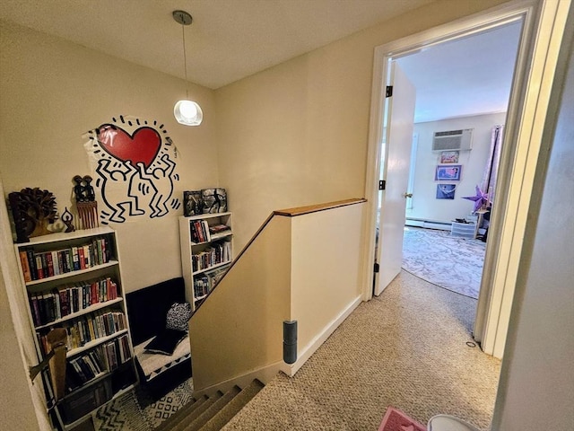 12 Sutton Ct Unit 12, Amherst, MA 01002 - corridor with an upstairs landing, baseboard heating, carpet, and a wall unit AC