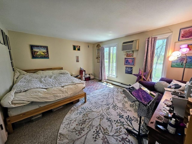 12 Sutton Ct Unit 12, Amherst, MA 01002 - bedroom featuring carpet, access to outside, an AC wall unit, and baseboard heating