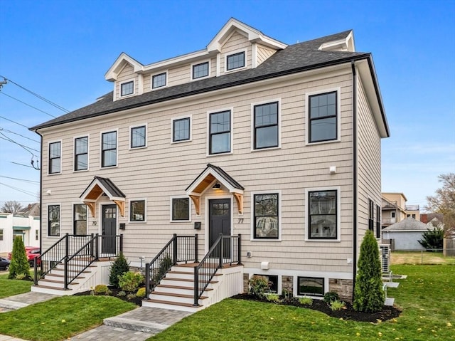 view of front of house with a front lawn