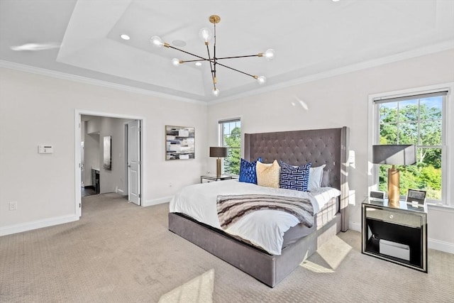 bedroom featuring a tray ceiling, an inviting chandelier, ornamental molding, light carpet, and baseboards