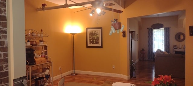 interior space featuring hardwood / wood-style floors and ceiling fan