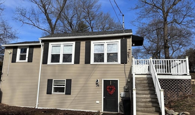 view of front of house with a wooden deck