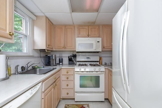 6 Loring Hills Ave Unit G4, Salem, MA 01970 - kitchen featuring white appliances, light brown cabinetry, a drop ceiling, light countertops, and a sink