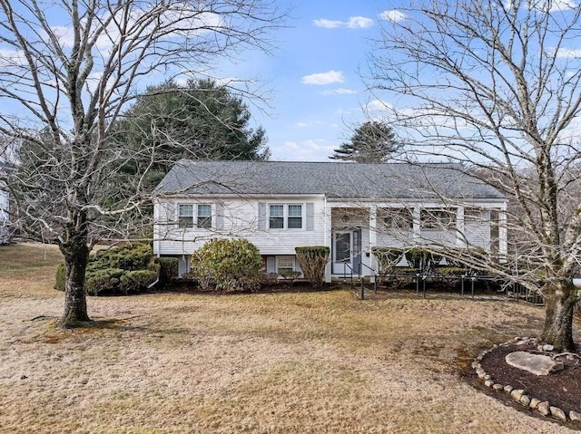 bi-level home featuring a front yard