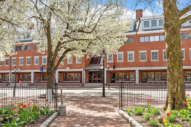 view of property with fence