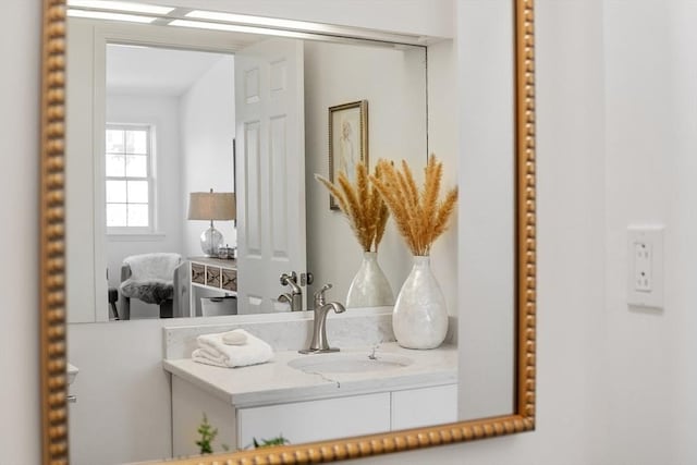 room details featuring indoor wet bar and a sink