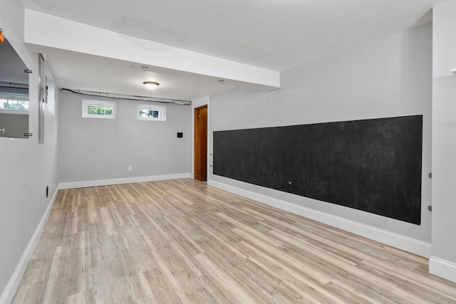 15 Janet Rd, Arlington, MA 02474 - below grade area featuring light wood finished floors and baseboards