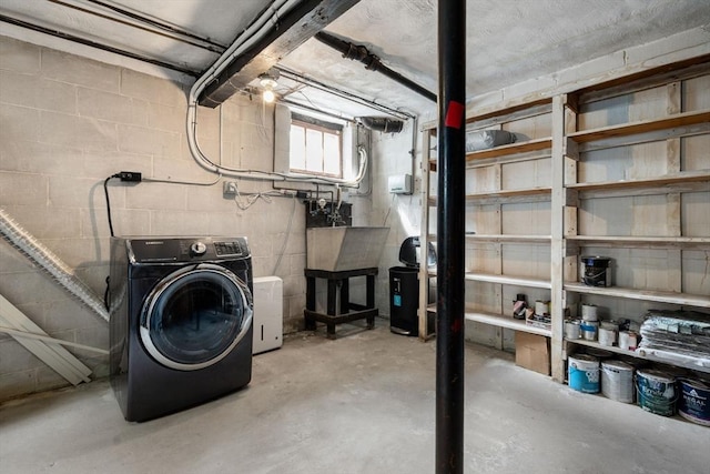 15 Janet Rd, Arlington, MA 02474 - below grade area featuring washer / dryer and concrete block wall