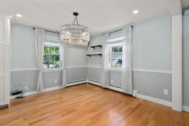 15 Janet Rd, Arlington, MA 02474 - unfurnished dining area featuring a chandelier, light wood-style flooring, baseboards, recessed lighting, and a baseboard radiator