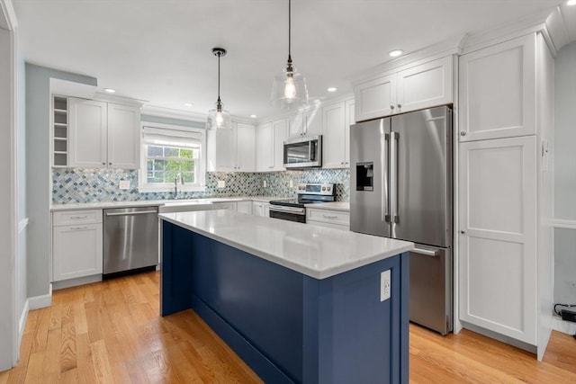 15 Janet Rd, Arlington, MA 02474 - kitchen with appliances with stainless steel finishes, white cabinetry, backsplash, and recessed lighting