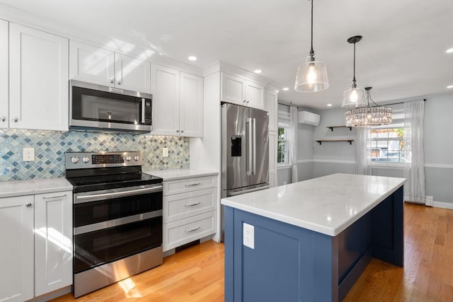 15 Janet Rd, Arlington, MA 02474 - kitchen with appliances with stainless steel finishes, light wood-type flooring, white cabinets, and recessed lighting