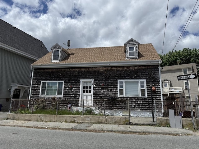 22 Taylor St Unit 1, Gloucester, MA 01930 - view of front of house with a shingled roof