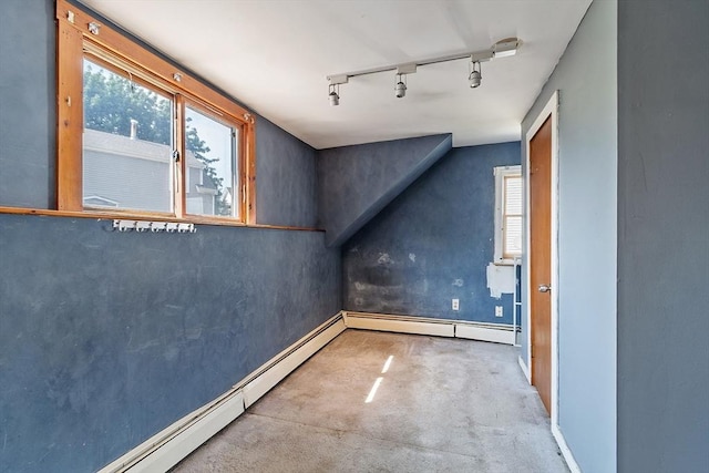 22 Taylor St Unit 1, Gloucester, MA 01930 - bonus room featuring a baseboard radiator, healthy amount of natural light, and concrete flooring