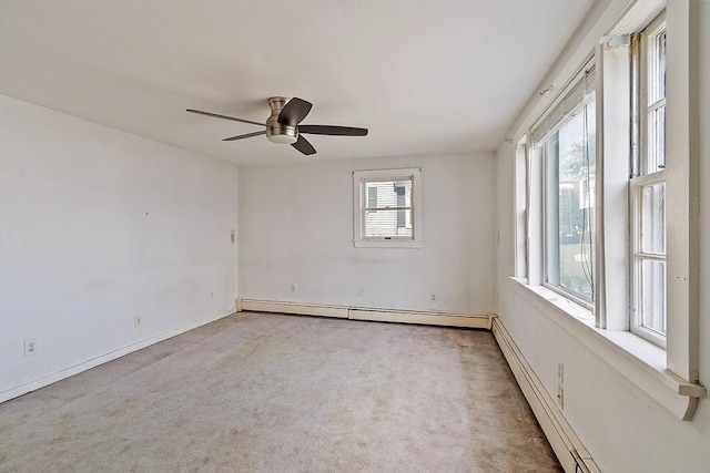 22 Taylor St Unit 1, Gloucester, MA 01930 - empty room with baseboard heating, ceiling fan, and carpet