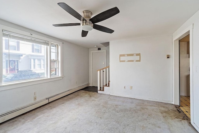22 Taylor St Unit 1, Gloucester, MA 01930 - empty room featuring baseboard heating, carpet, stairway, and a ceiling fan