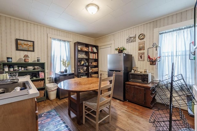 58 Field St, West Springfield, MA 01089 - dining space with crown molding and wood-type flooring