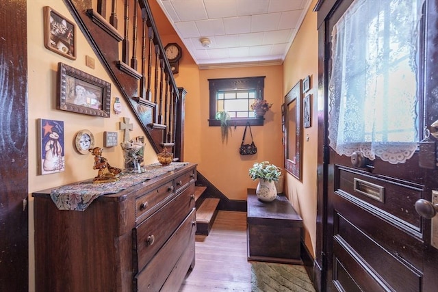 58 Field St, West Springfield, MA 01089 - foyer with stairs, wood finished floors, and crown molding