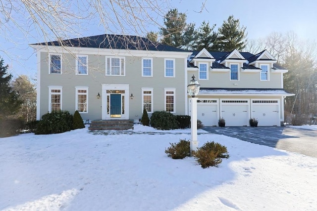 view of front of home with a garage