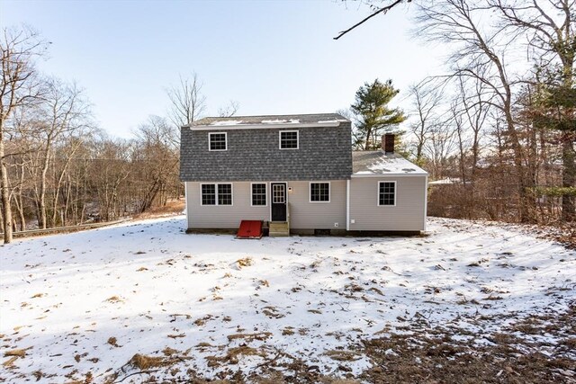 view of snow covered property