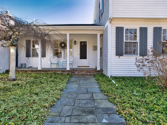 entrance to property with covered porch