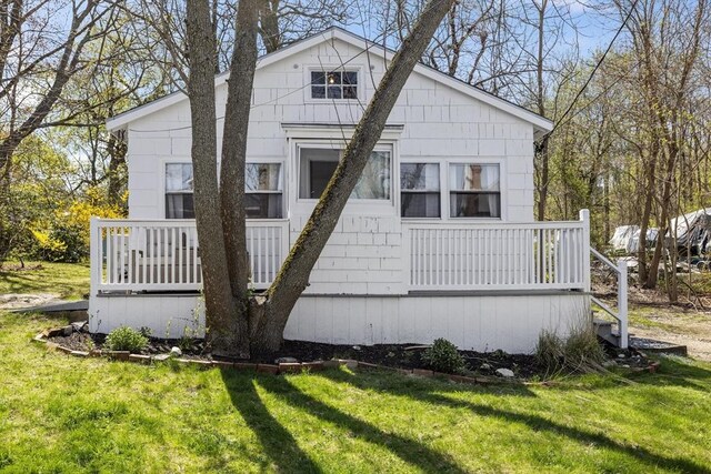 9 Nonantum Rd, Marblehead, MA 01945 - back of property featuring a yard and a wooden deck