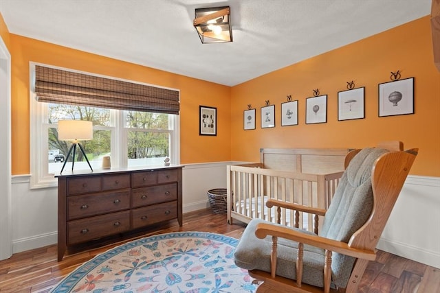 bedroom featuring wood finished floors