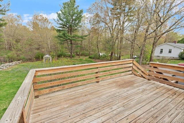 deck featuring a lawn