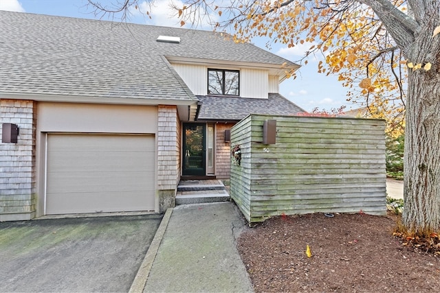 view of front of property with a garage