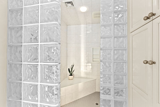 bathroom featuring a shower