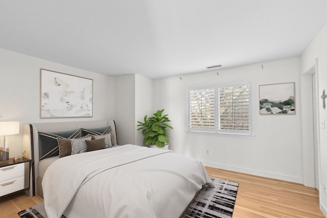 bedroom featuring light wood-type flooring