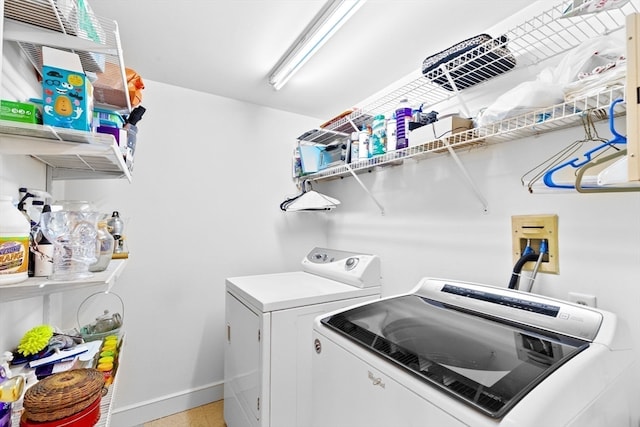 washroom featuring separate washer and dryer