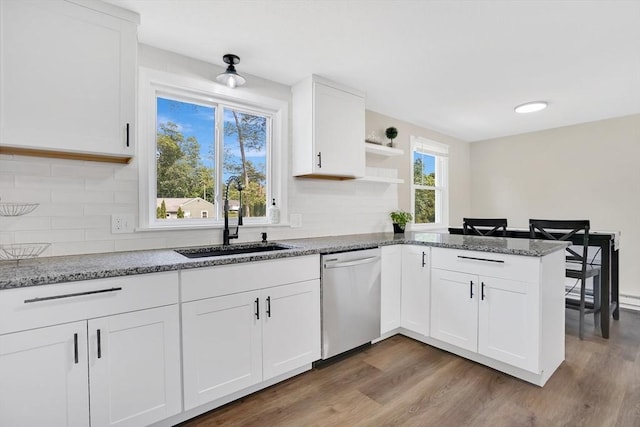216 Pineview Cir, Agawam, MA 01001 - kitchen with dishwasher, a sink, wood finished floors, and a peninsula