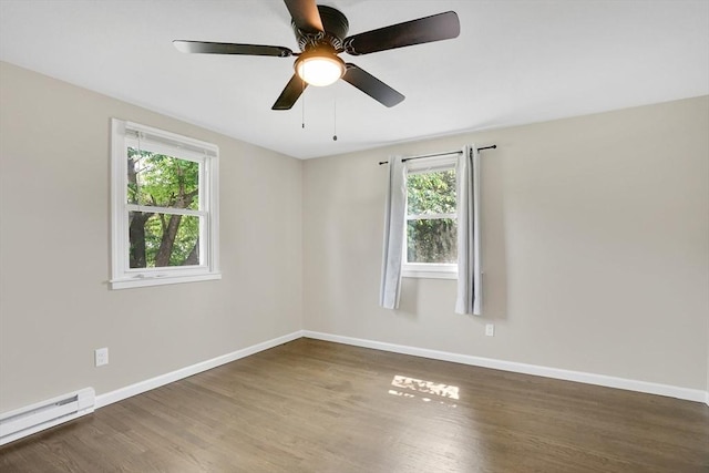 216 Pineview Cir, Agawam, MA 01001 - spare room with a baseboard radiator, plenty of natural light, wood finished floors, and baseboards