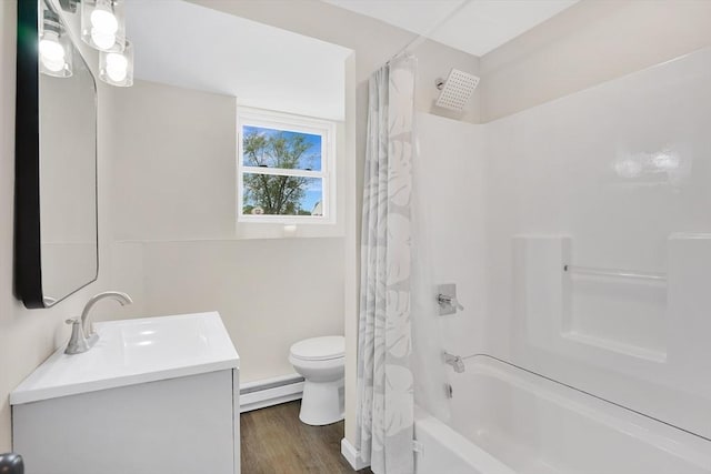 216 Pineview Cir, Agawam, MA 01001 - bathroom featuring a baseboard heating unit, vanity, toilet, shower / tub combo, and wood finished floors