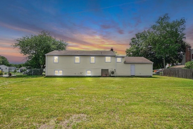 216 Pineview Cir, Agawam, MA 01001 - back of property at dusk with a cooling unit